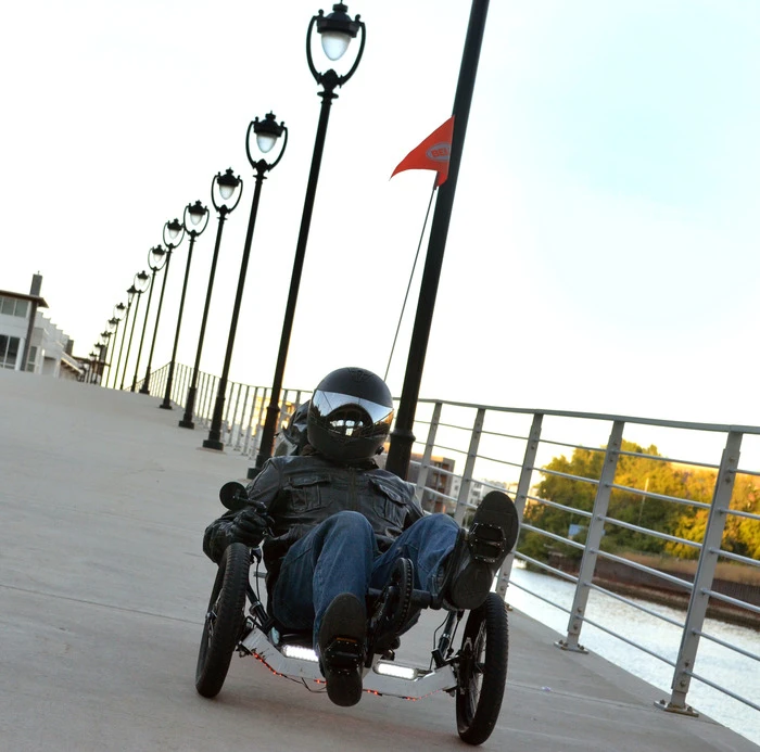The trike is shipped with a programmed power limit of less than one horsepower, though an included cycle computer allows the user to modify this to anywhere between 80 and 4000 watts