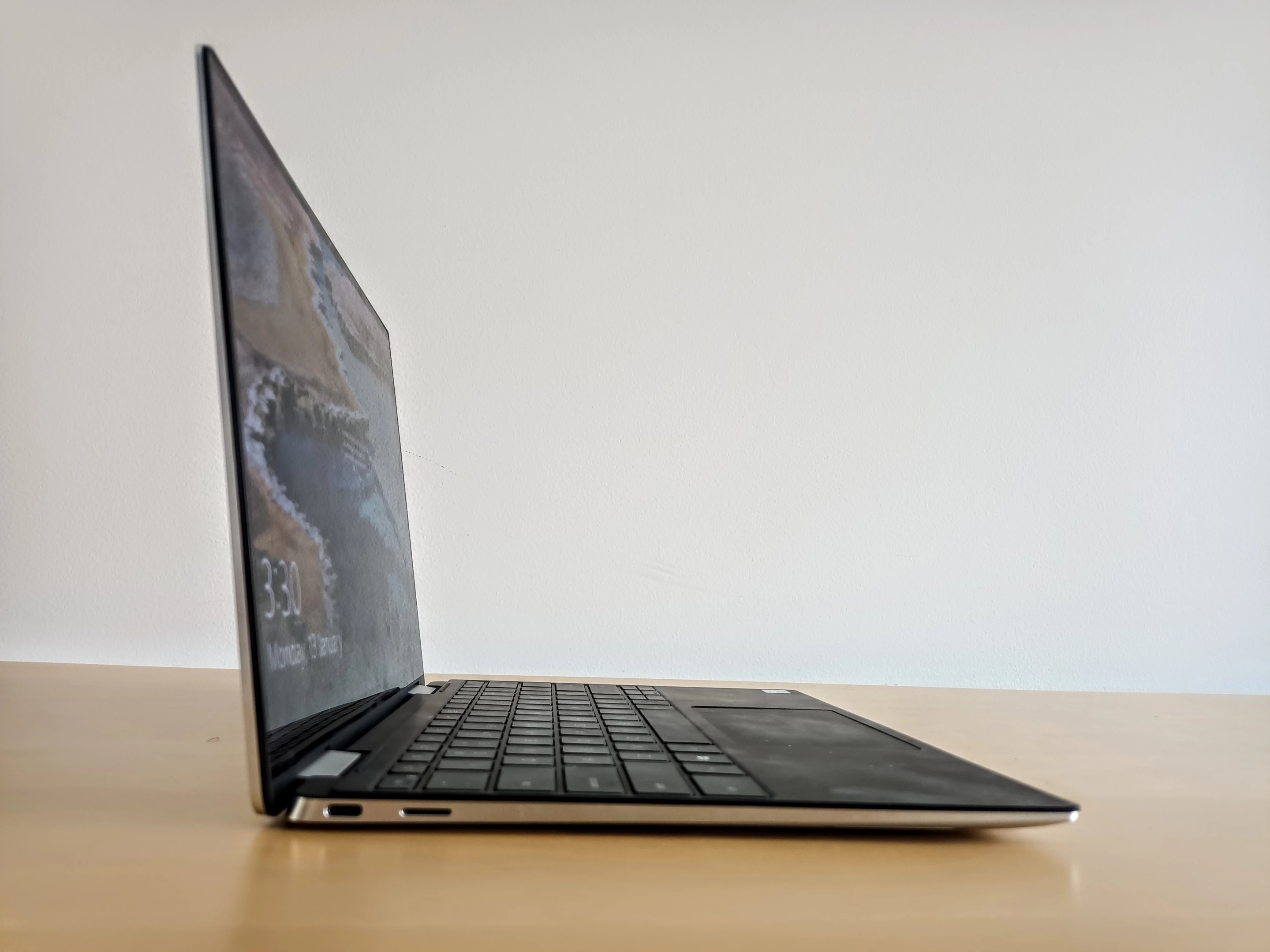 One USB-C Thunderbolt port on each side, plus a MicroSD card reader