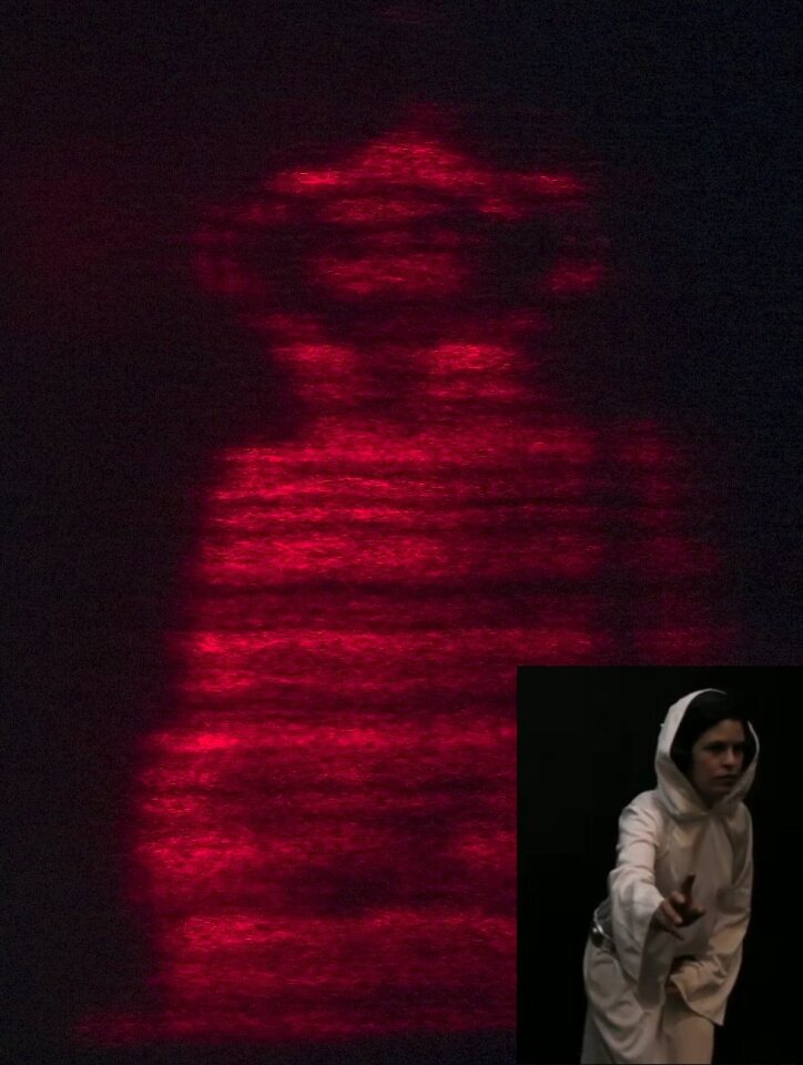 Edwina Portocarrero from Bove's group, decked out in tunic and wig, stood in for Carrie Fisher and re-enacted the famous holographic message, which was captured and displayed in real-time