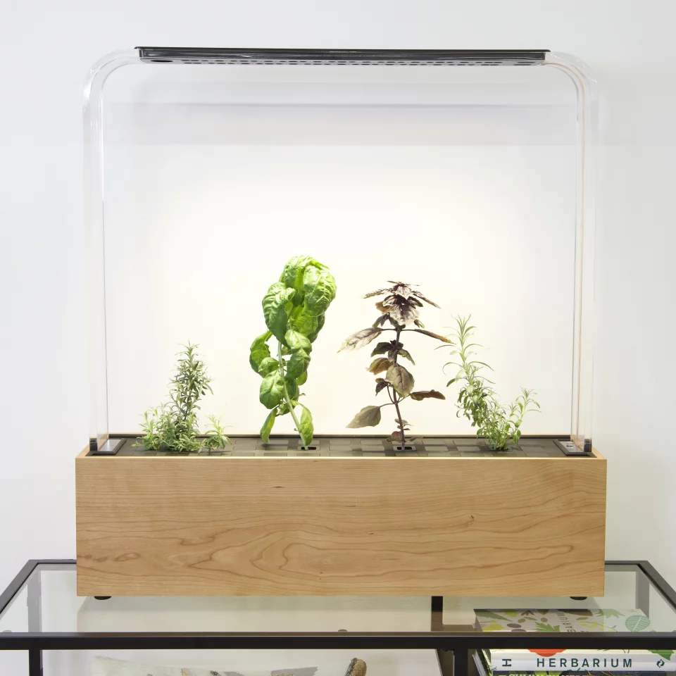 The Herb Garden base comes in cherry, maple or walnut