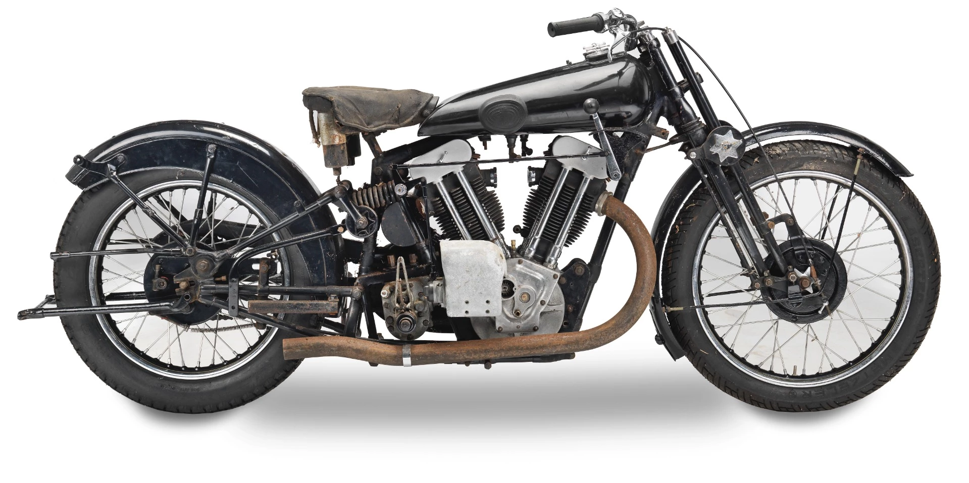 This 1933 Brough Superior 981cc SS100 Project sold for £161,000 after being stored since the 1970s. The bike's history makes a great story as it was purchased in 1963 for £33 as the first motorcycle for Jean Knight, a woman living in South London and working in North London , who used the bike for her daily commute for many years. Full story in the Auction Description.