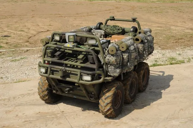 Lockheed Martin's autonomous Squad Mission Support System carries gear and charges batteries for troops