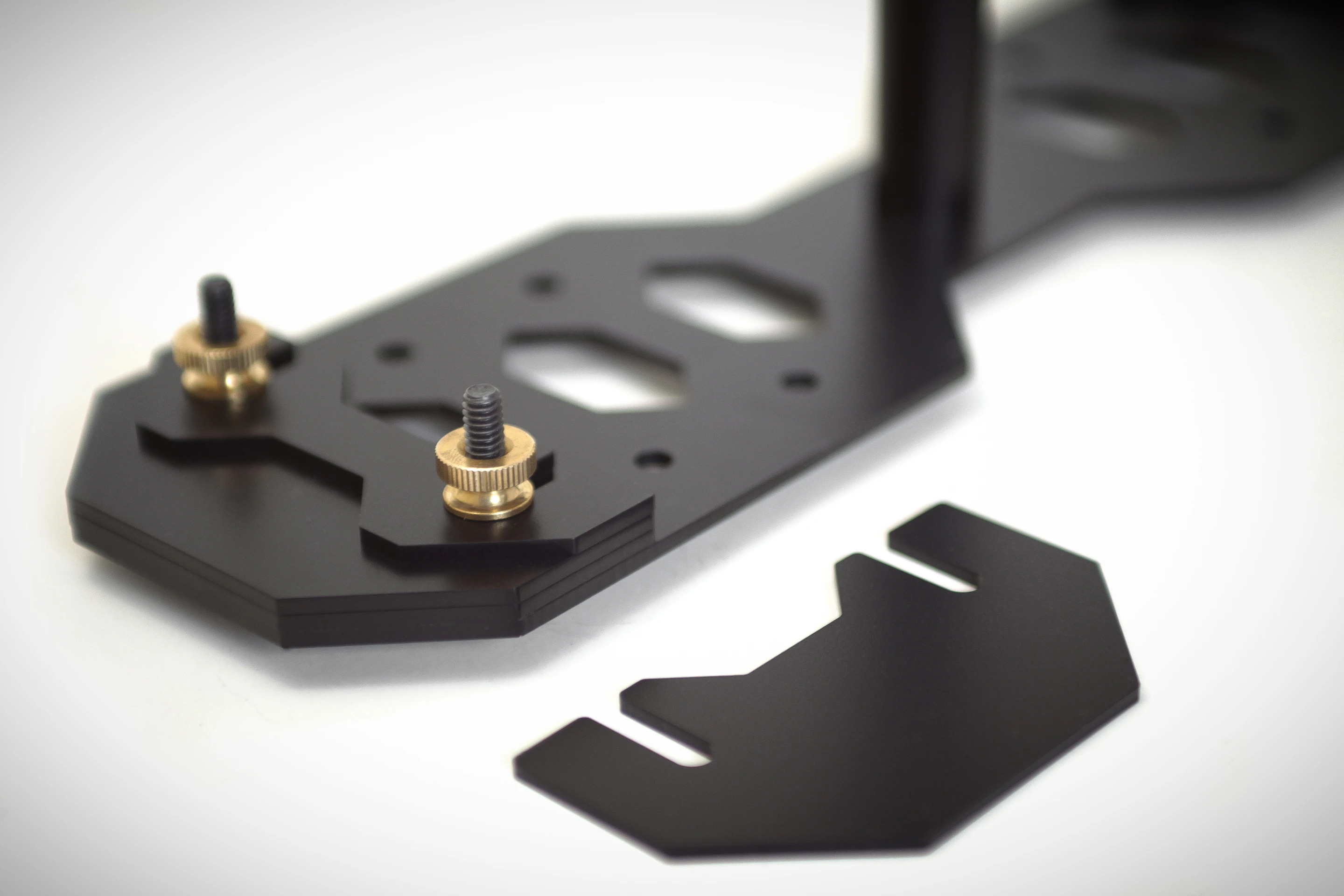 The Supraflux Stabilizer uses two sizes of slide-out counterweights