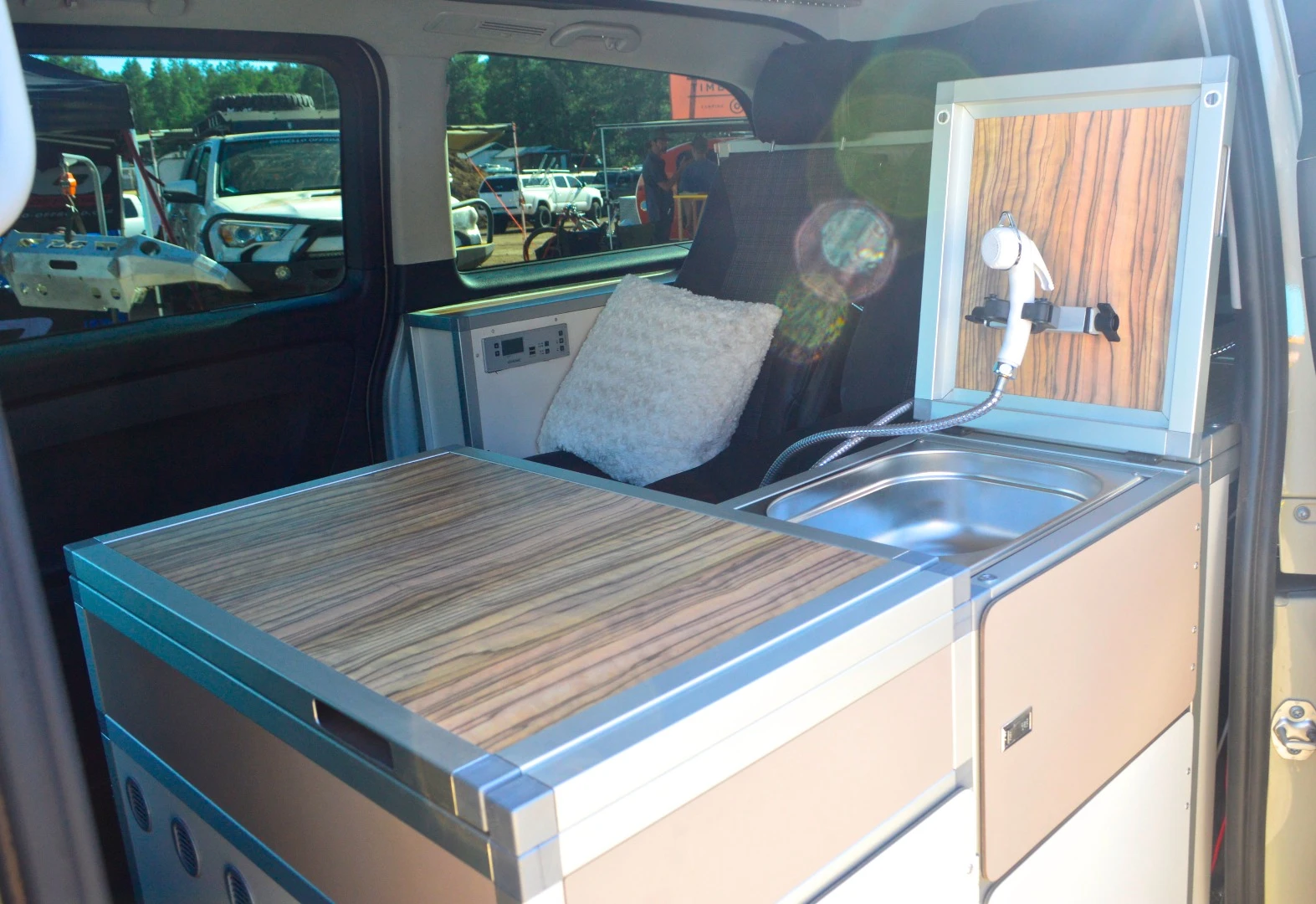 The Metris' removable faucet holder can be secured to the outside of the van to work as an exterior shower