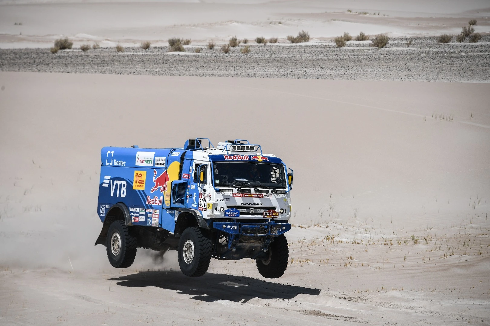 Where else but the Dakar? A gently levitating Red Bull Kamaz truck.