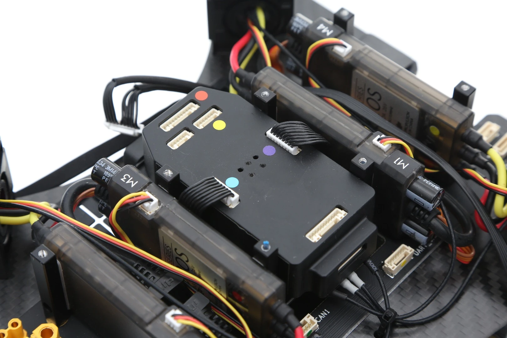 The Matrice 100 features several communication ports, power supply leads and expansions bays for extras components, so that additional hardware can be fixed to the drone to afford it new functionality