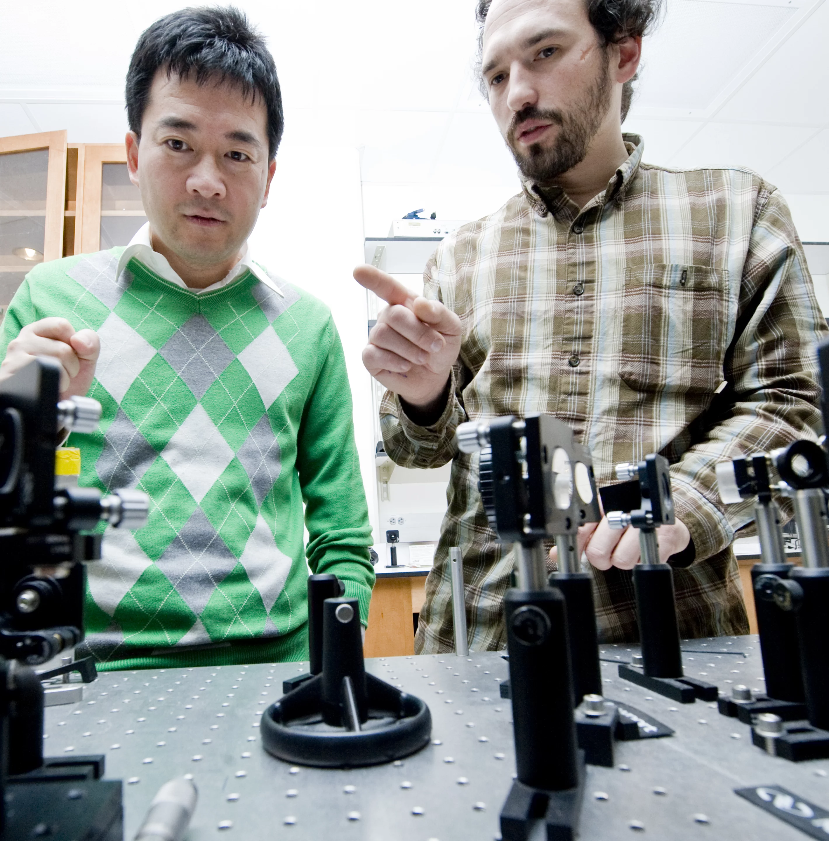 Ji-Xin Cheng, left, an associate professor of biomedical engineering and chemistry at PU, and biomedical engineering research scientist Mikhail N. Slipchenko