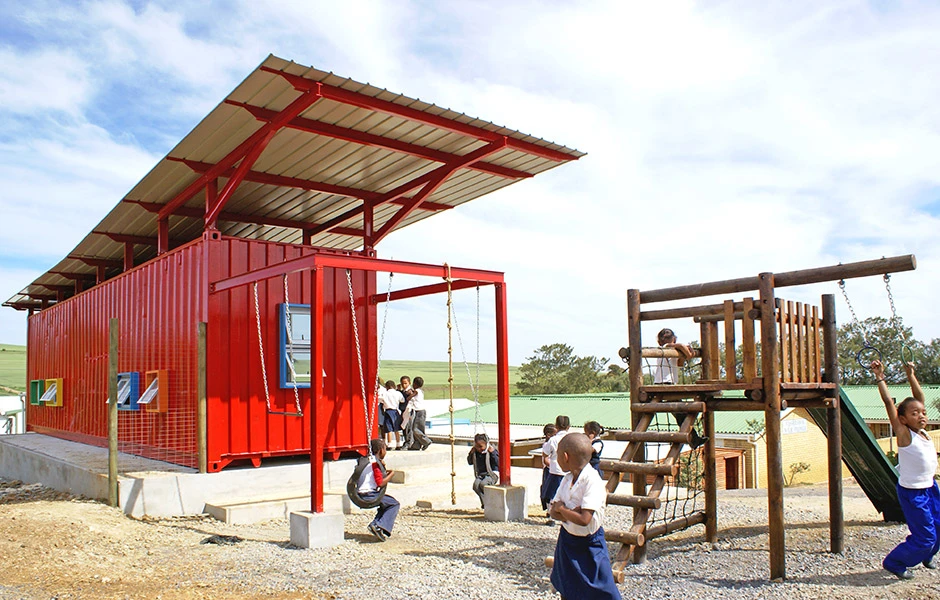 The most radical addition to the container is a horizontal solar shade - an expansive second roof above the container preventing solar radiation directly arriving at the classroom's outer surfaces thanks to the buffer of air between