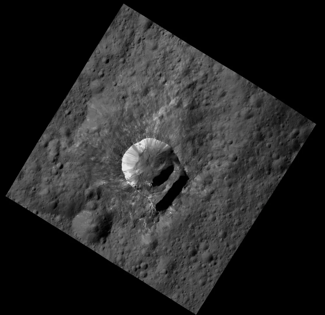 Image of the Oxo Crater on Ceres – the bright rim and streaks are an example of how an asteroid strike can expose salt-rich materials