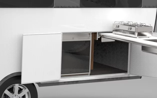 An exterior door adjacent to the slide-out kitchen unit provides access to the refrigerator