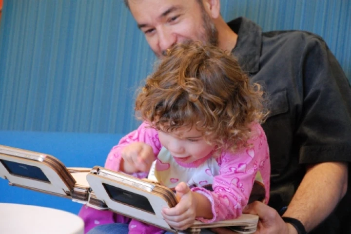 Parent and child enjoying the Storybook experience