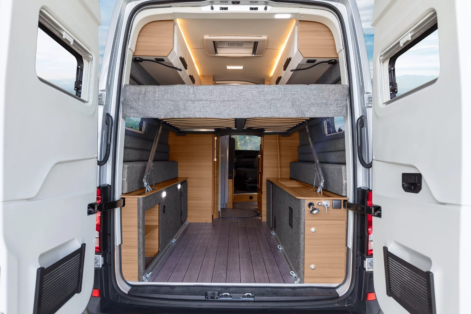 We like the Boxdrive's dual load doors and lifting bed set-up better than Volkswagen's California XXL half-gate