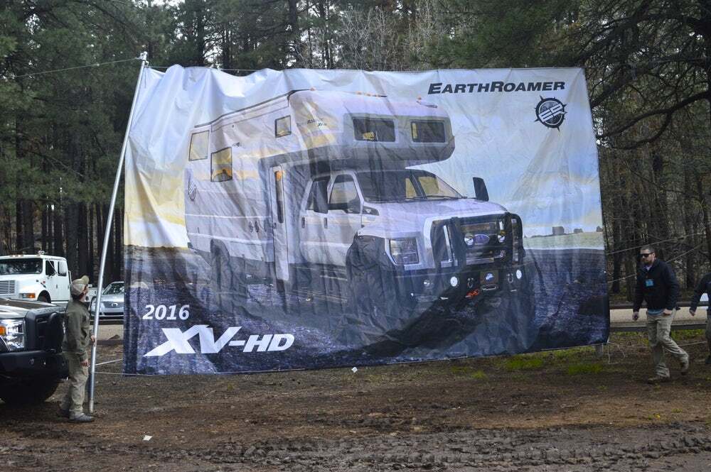 We stood around in cold mud waiting for the EarthRoamer XV-HD to show up for the first time, only to realize that this banner was as good as it got. We hope to remedy that by seeing the XV-HD in person at this week's SEMA Show, about two-and-a-half years after the May 2015 press conference in the photo