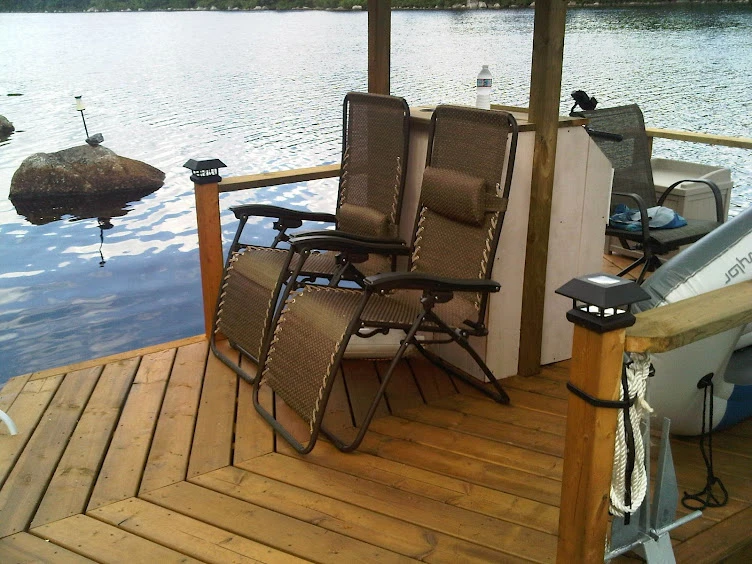 The cabin of the boat has been modestly fitted with two rear storage seats and two lounge chairs