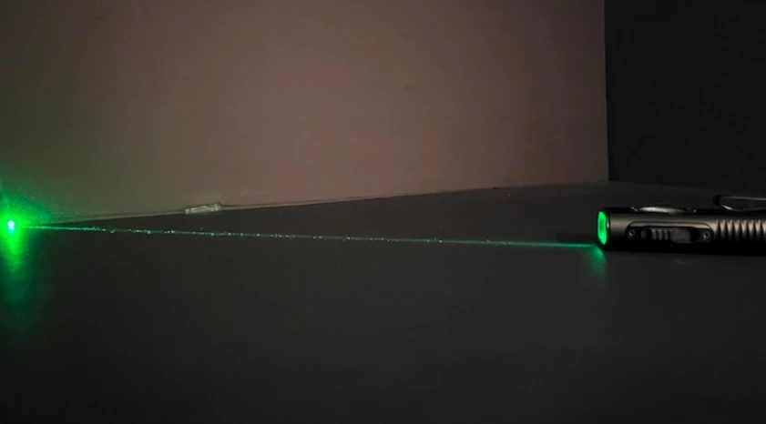 A green laser can serve as a work presentation pointer or an signal device in the wild