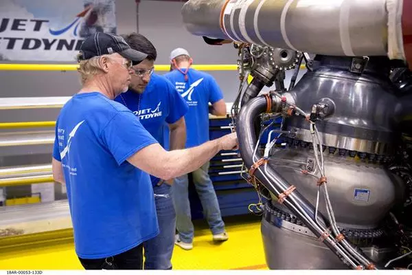 Aerojet Rocketdyne technicians inspect the first AR-22 rocket engine at the Aerojet Rocketdyne facility located at Stennis Space Center