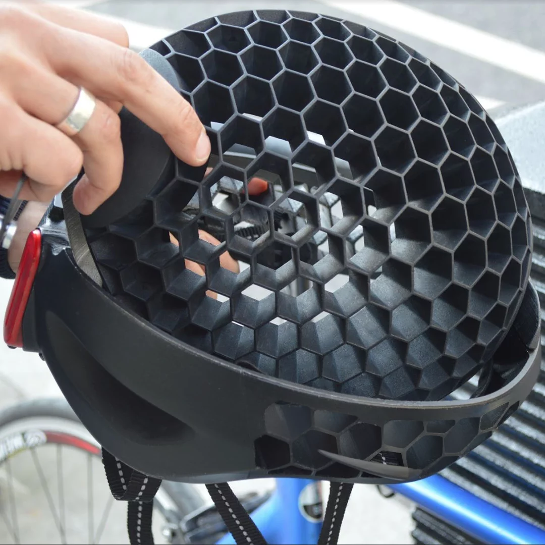 The top "dome" part of the Cyclo swivels around laterally (it pivots at the front and back), so it nests upside-down within its bottom section