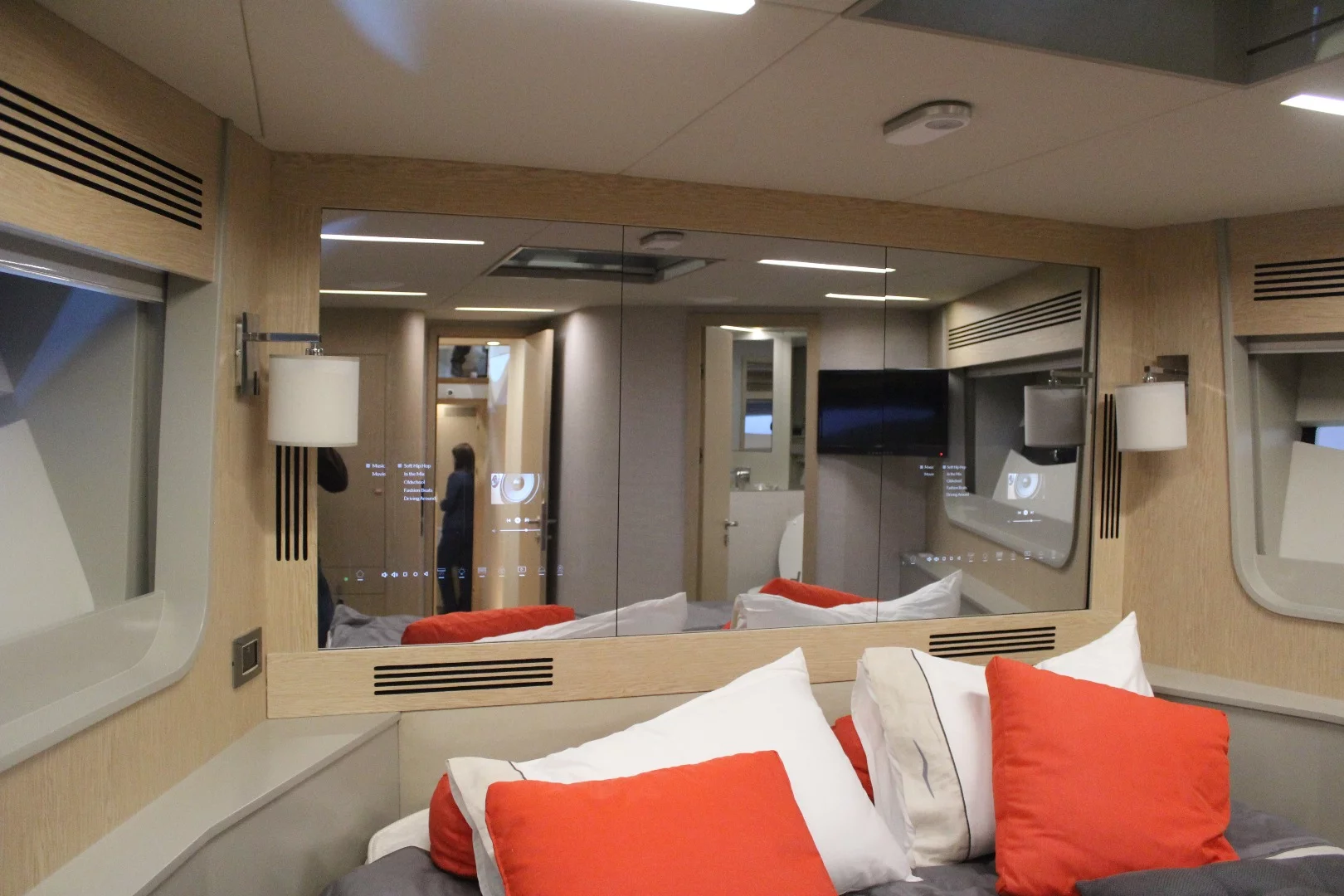 His and her smart mirrors in the second bedroom