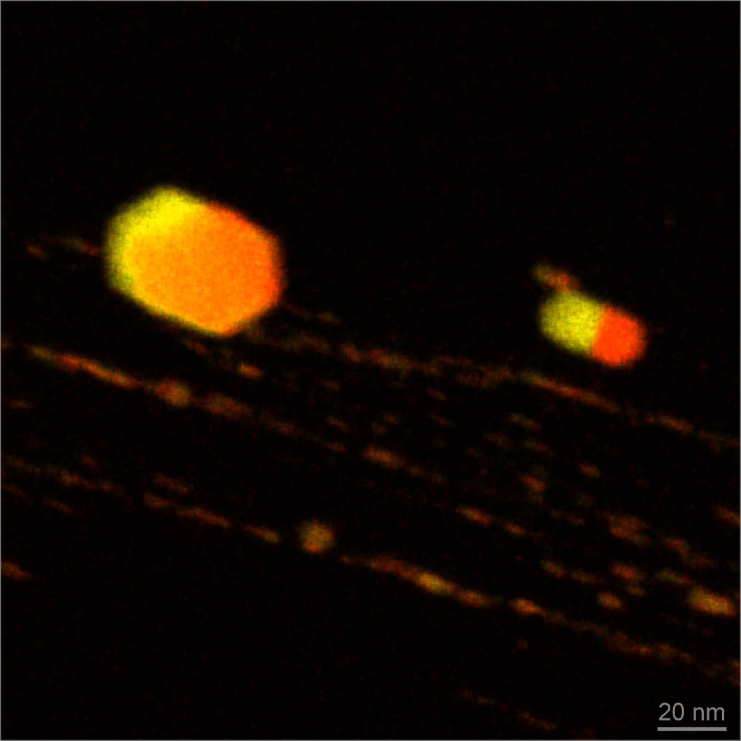 A chemical map showing iron (yellow) and sulfur (red) impurities inside the diamonds