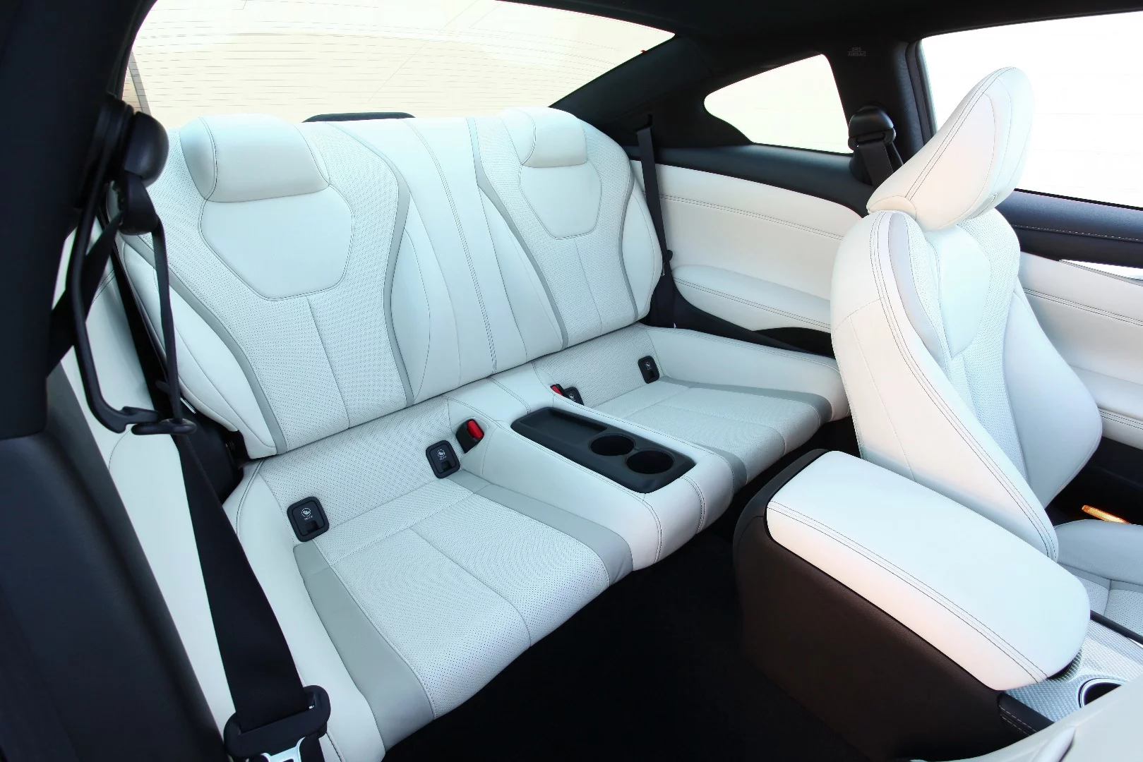 The rear seats in the Q60 are usable, but you wouldn't want to force adults to stay there for too long