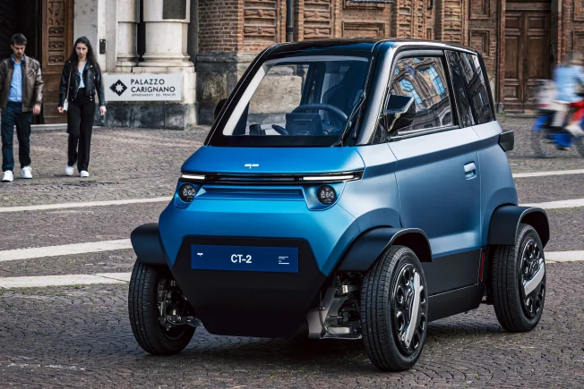Microcar Two Wheel 'City Transformer' microcar widens wheel track for high-speed stability