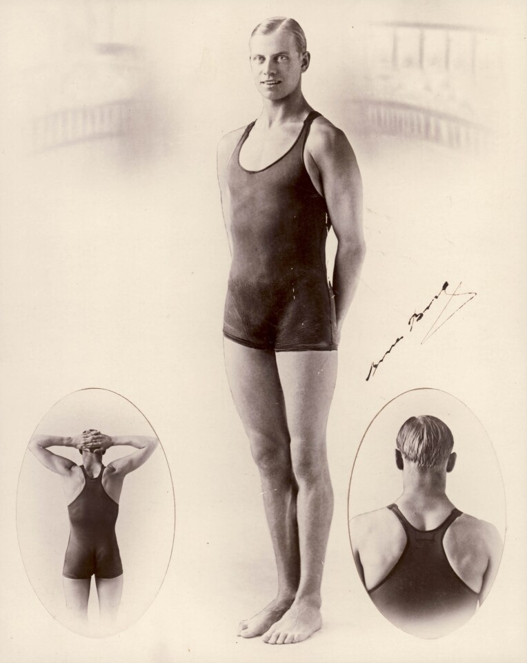 Black and white photograph of Swedish champion swimmer Arne Borg wearing a Speedo one-piece tank-style swimsuit. The swimsuit features the "racer back" design developed by Speedo. Arne Borg was one of the dominant swimmers of the 1920s, setting 32 world records in swimming between 1921 and 1929 (Photo: Powerhouse Museum)