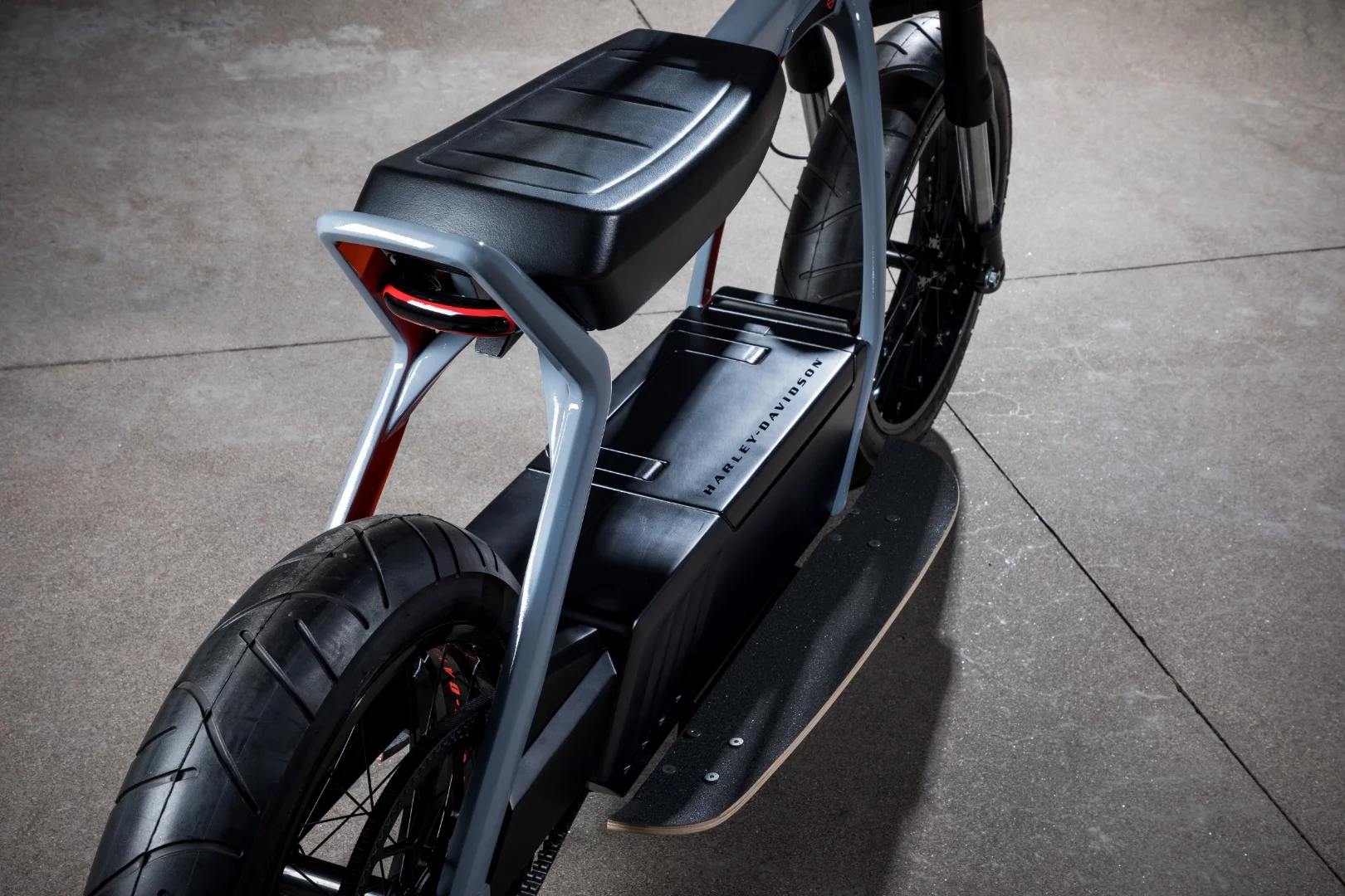 Low-slung electric powertrain, bench seat and thin tires polish off the look