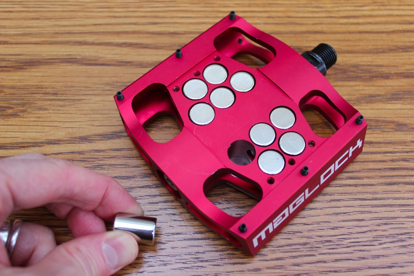 The attractive force of MagLOCK pedals can be adjusted by adding or removing magnets from within them