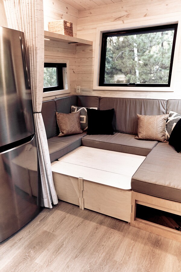 The Draper's U-shaped sofa, with the table in a lowered position