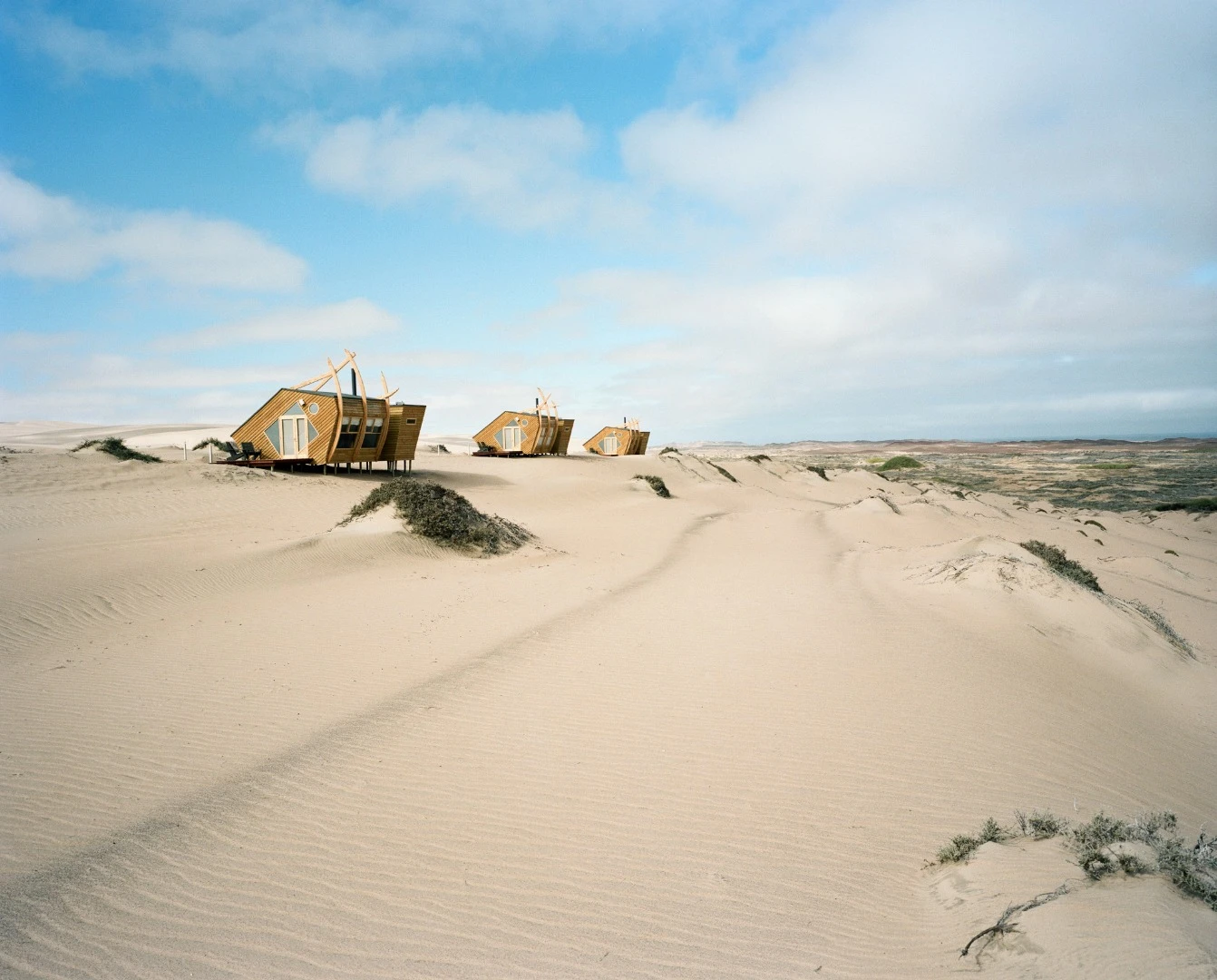 The solar-powered chalets making up Shipwreck Lodge in Namibia are built to mimic fallen ships