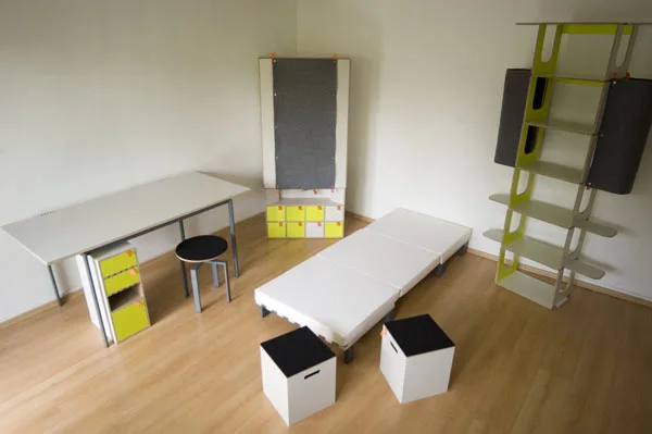 Casulo contains an armoire cupboard, desk table and cabinet, height-adjustable revolving chair, two stools and a bed with mattress