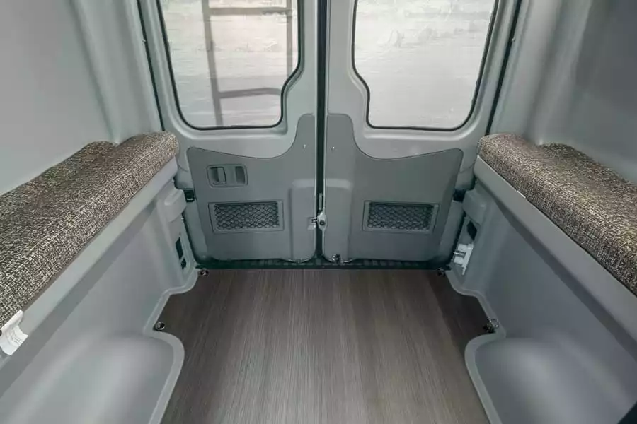 When the bed lifts out of the way, the Winnebago Revel offers plenty of room for bikes and other gear