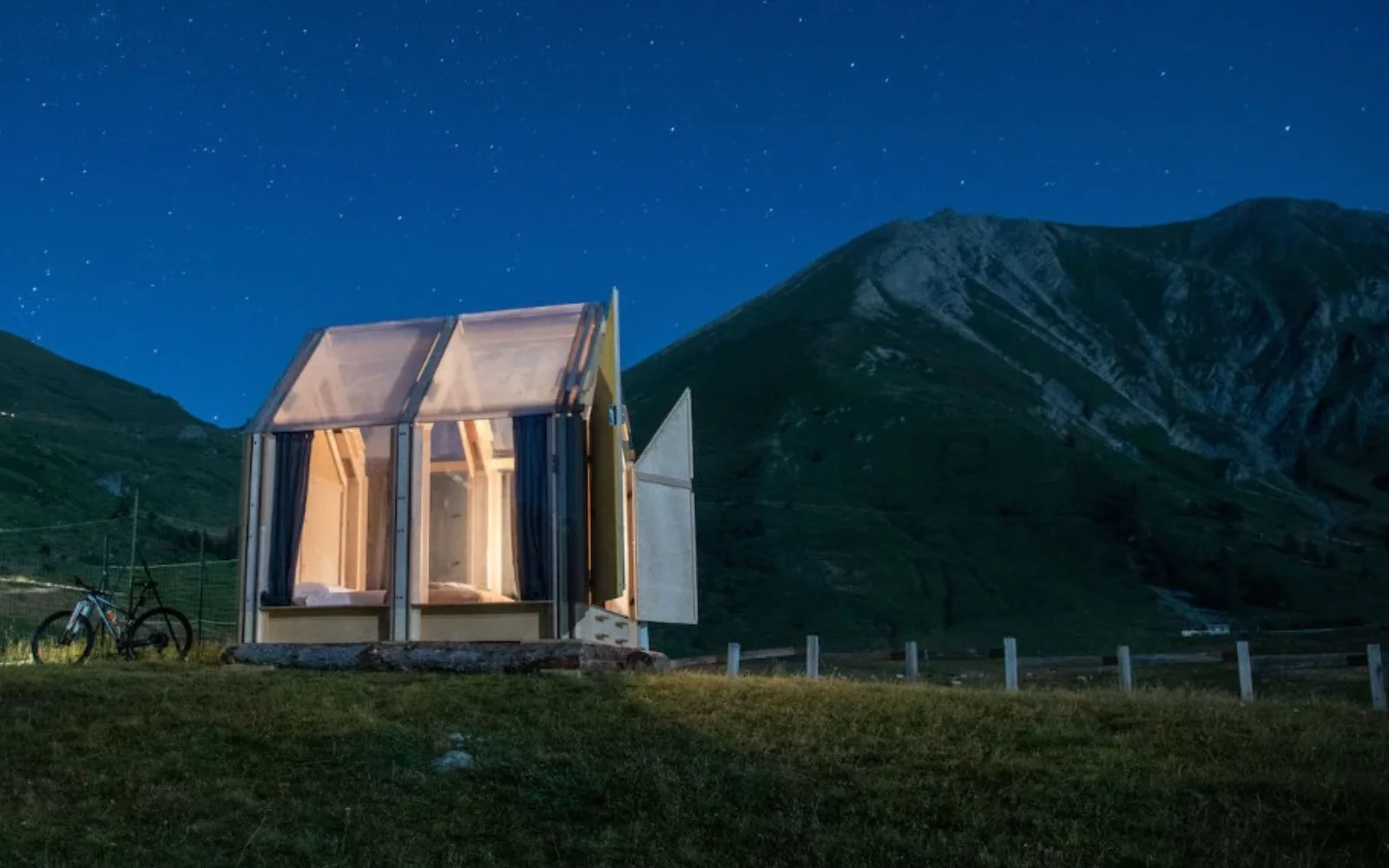 This striking transparent-roof cabin is only 6 square meters (65 sq ft) large and is currently being used as a unique glamping experience in the Italian Alps