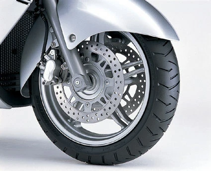 Suzuki's original Burgman lacked nothing in the braking department (pictured) but subsequent models have had updated front brakes with floating discs and the model now has an optional antilock braking system (ABS).