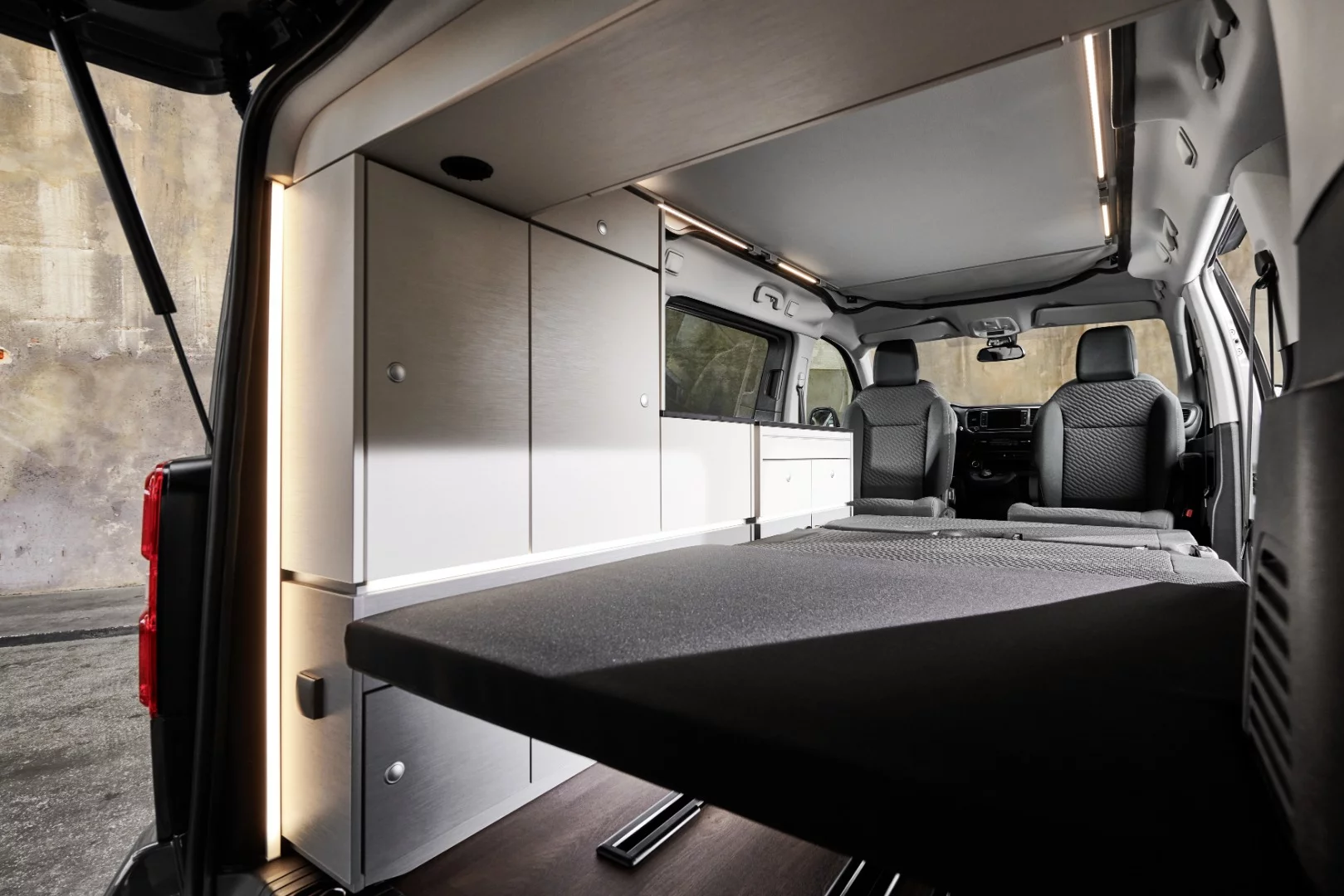The drop-down rear bench fills the cabin out with bed space