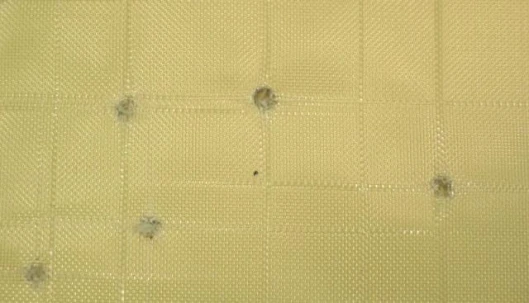 The front of Kevlar fabric after being shot with bullets