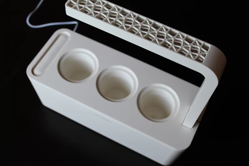 The Smart Herb Garden has three slots into which the plant cartridges are plugged