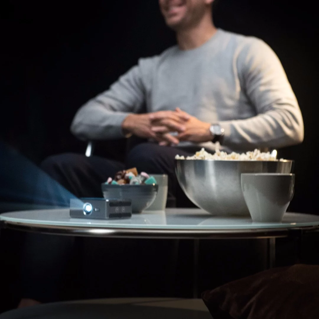 The Sweam projector puts out 60 - 100 lumens, which should be fine for a dimly lit room or outdoor viewing when the sun's gone down