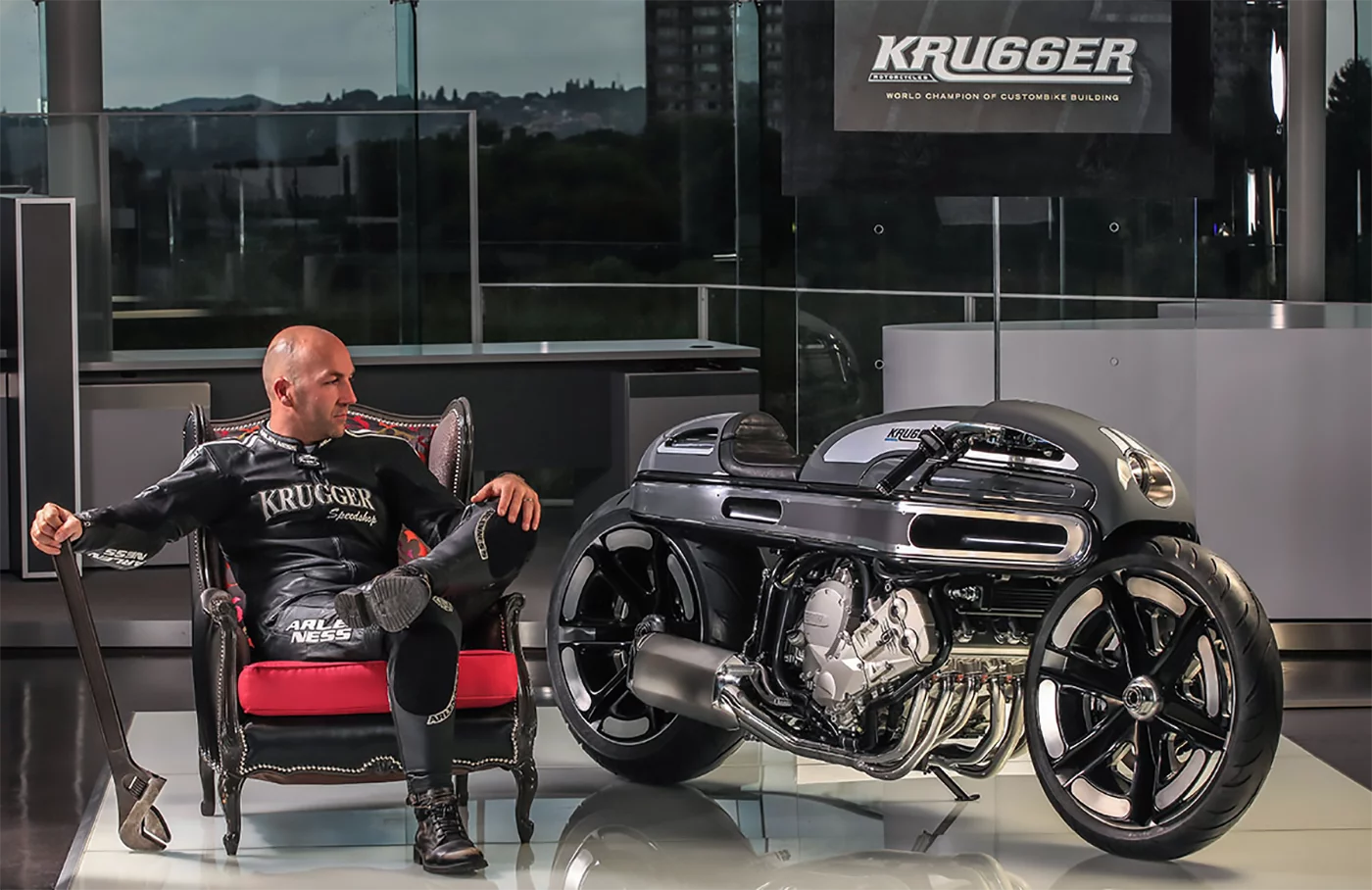 Bertrand's most recent win in the AMD Custom Bike Building World Championship was in 2014 where BMW's 1600cc straight six engine was used to create a custom named "nurb's." That's Krugger proprietor Freddie Bertrand seated with nurb's.