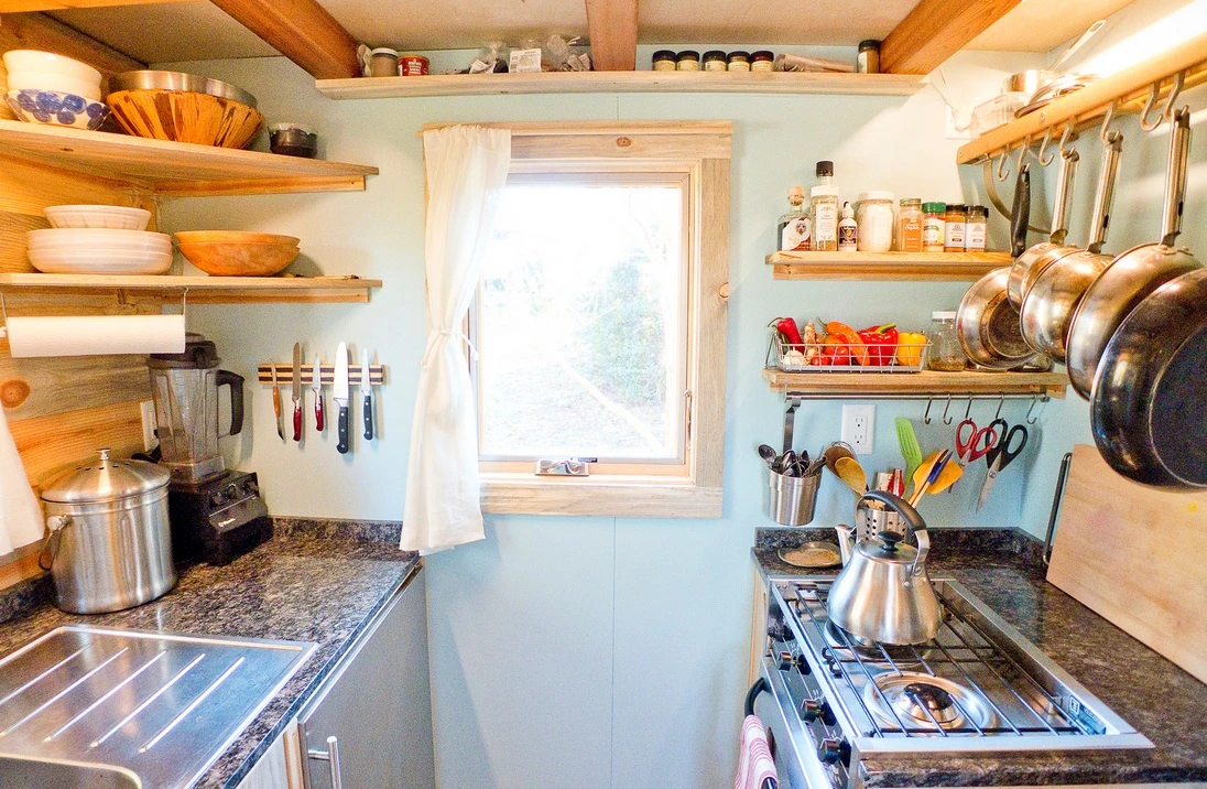 The compact kitchen is also light filled and practical