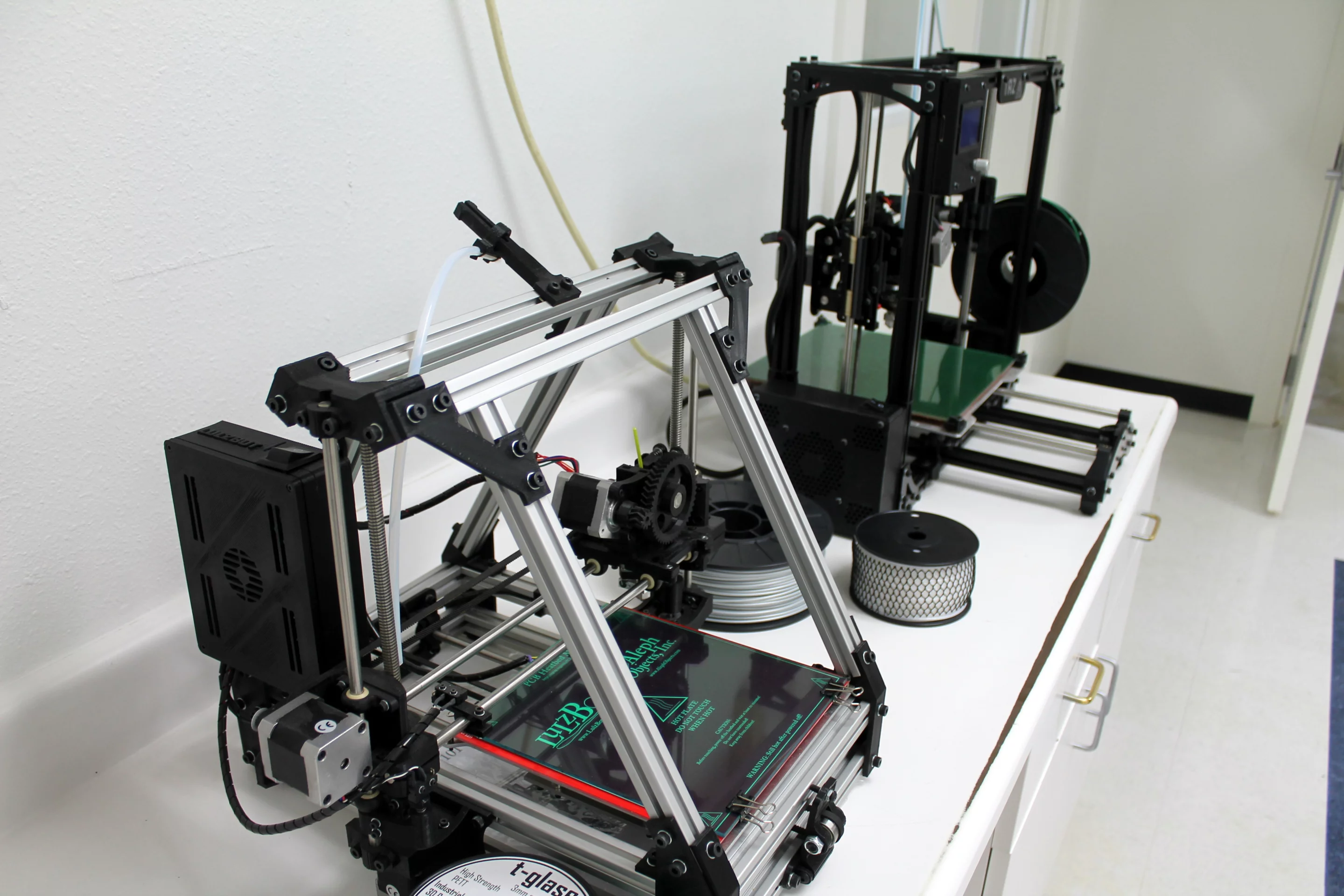 An AO-101 and LulzBot TAZ 3 pose together for comparison