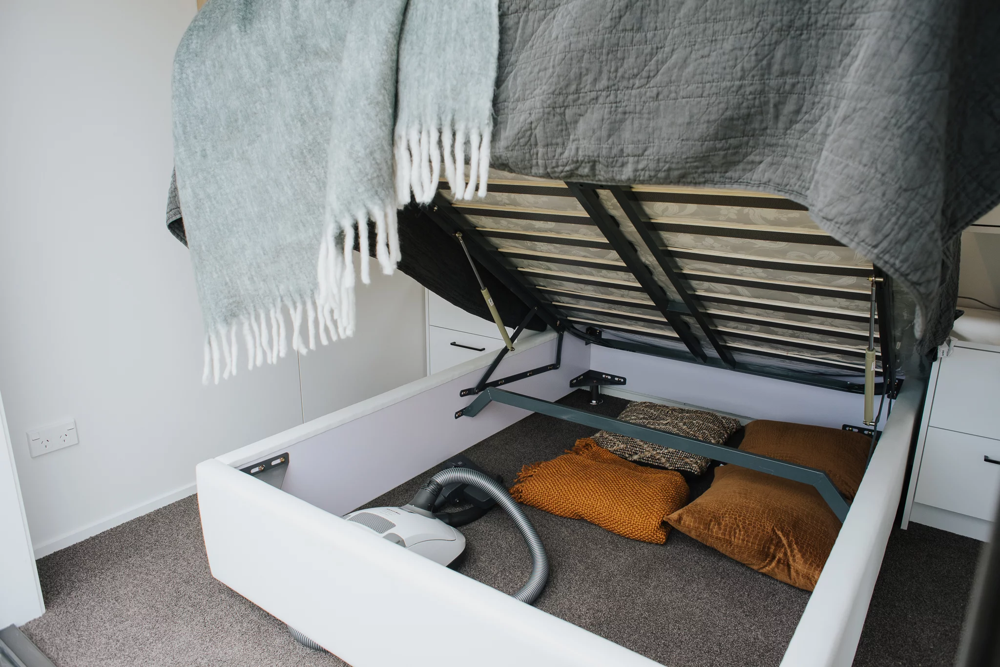 The Dark Horse's bedroom features a lift-up storage bed