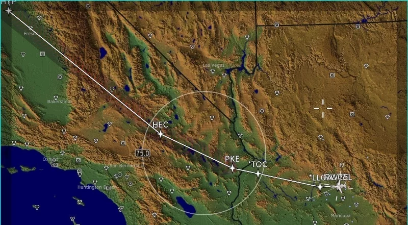 Honeywell's predictive software display shows unacceptable sonic booms will occur in the gray shaded area with red curves if the current flight plan is not modified