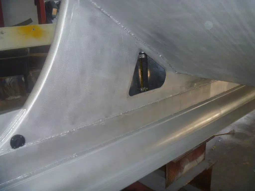 The fuel hose connecting the inlet on the bow deck to the ski tanks which are underwater when the vessel is stationary or slow moving