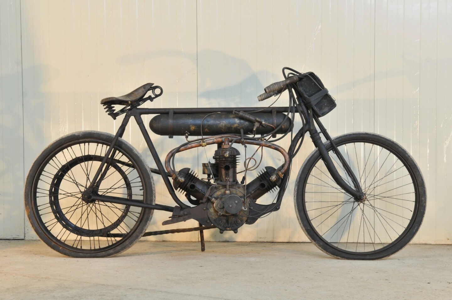 Alessandro Anzani is Italy's answer to Glen Curtiss, with both men riding motorcycles of their own manufacture in competition before going on to build massive companies around their engineering expertise. Anzani even made spare parts for Curtiss engines for many years. The engine in this motorcycle is not much different to the Anzani engine used by Louis Blériot to make the first flight across the English Channel in 1909. While Anzani was initially known for his 3-cylinder fan engines like the one above, he went on to make 2-, 3-, 4-, 5-, 6-, 7-, 10-, 14- and 20-cylinder engines in his factories in England, France and Italy, providing them to motorcycle manufacturers such as McEvoy, Montgomery, Cotton, and Greeves, while cars that used Anzani's engines included Morgan, AC, and Frazer-Nash. While the Anzani fetched nearly three times its estimate at $102,242(€ 83,440), another motorcycle on offer at Artcurial's official Retromobile auction with a three-cylinder fan layout caused a lot of interest, because the crankcase is clearly stamped as a Buchet, yet it is near identical to the Anzani and predates it by a year. The Buchet sold for €56,024 ($68,648), more than double its estimate.