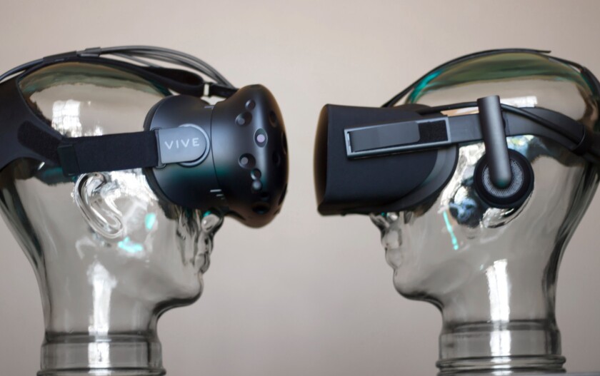 HTC Vive (left) with Oculus Rift