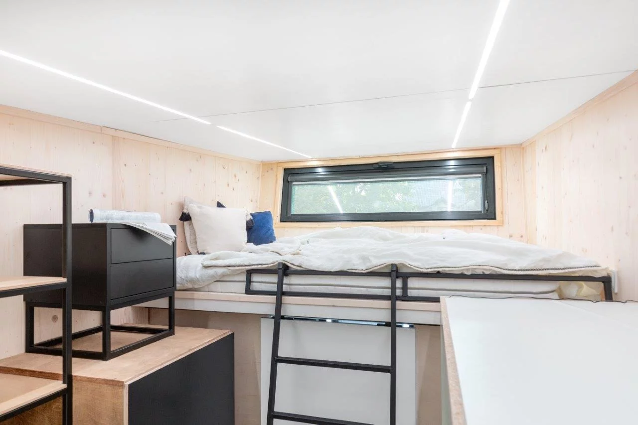 The Dark Vader features a typical loft bedroom with a small ceiling that's reached by a storage-integrated staircase