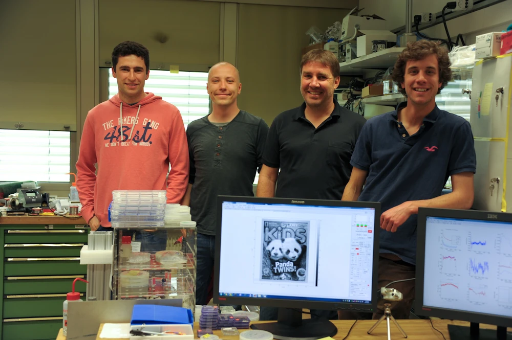The team of scientists who created the smallest magazine cover
