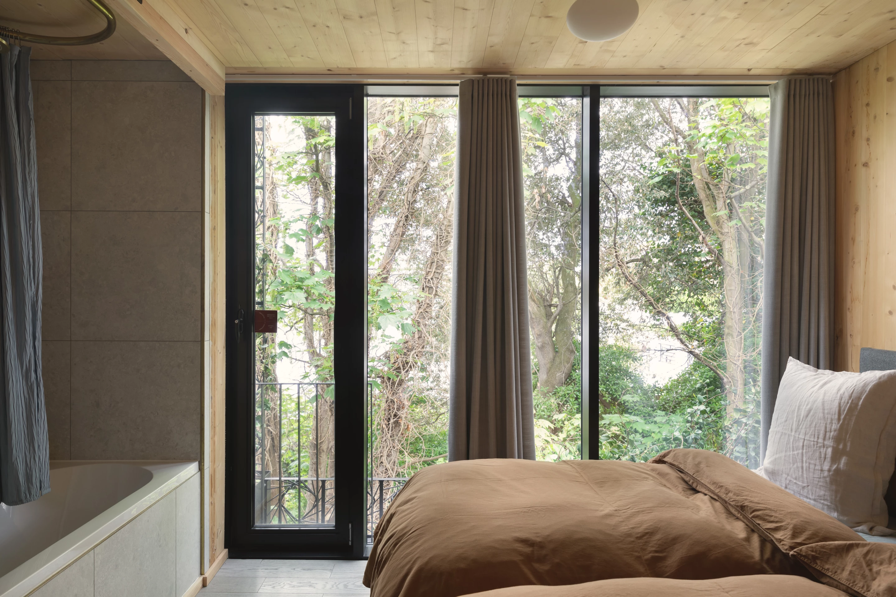 Woven's upper floor includes four bedrooms, each of which has an en-suite bathroom