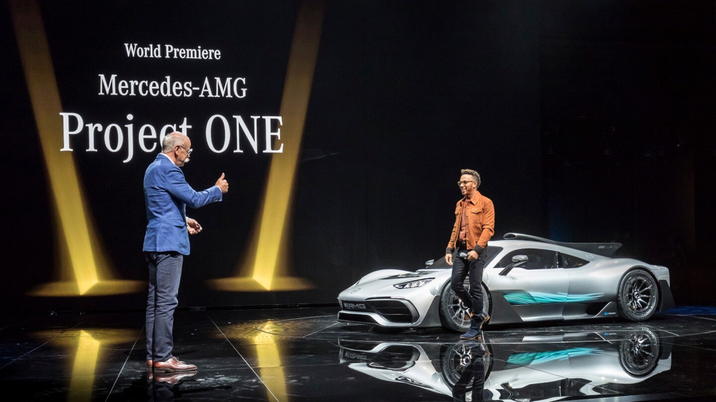 Dr. Dieter Zetsche, Chairman of Daimler AG and Head of Mercedes-Benz Cars, and the three-time world champion of the Formula 1, Lewis Hamilton, present the show car Mercedes-AMG Project ONE during the eve of the IAA.